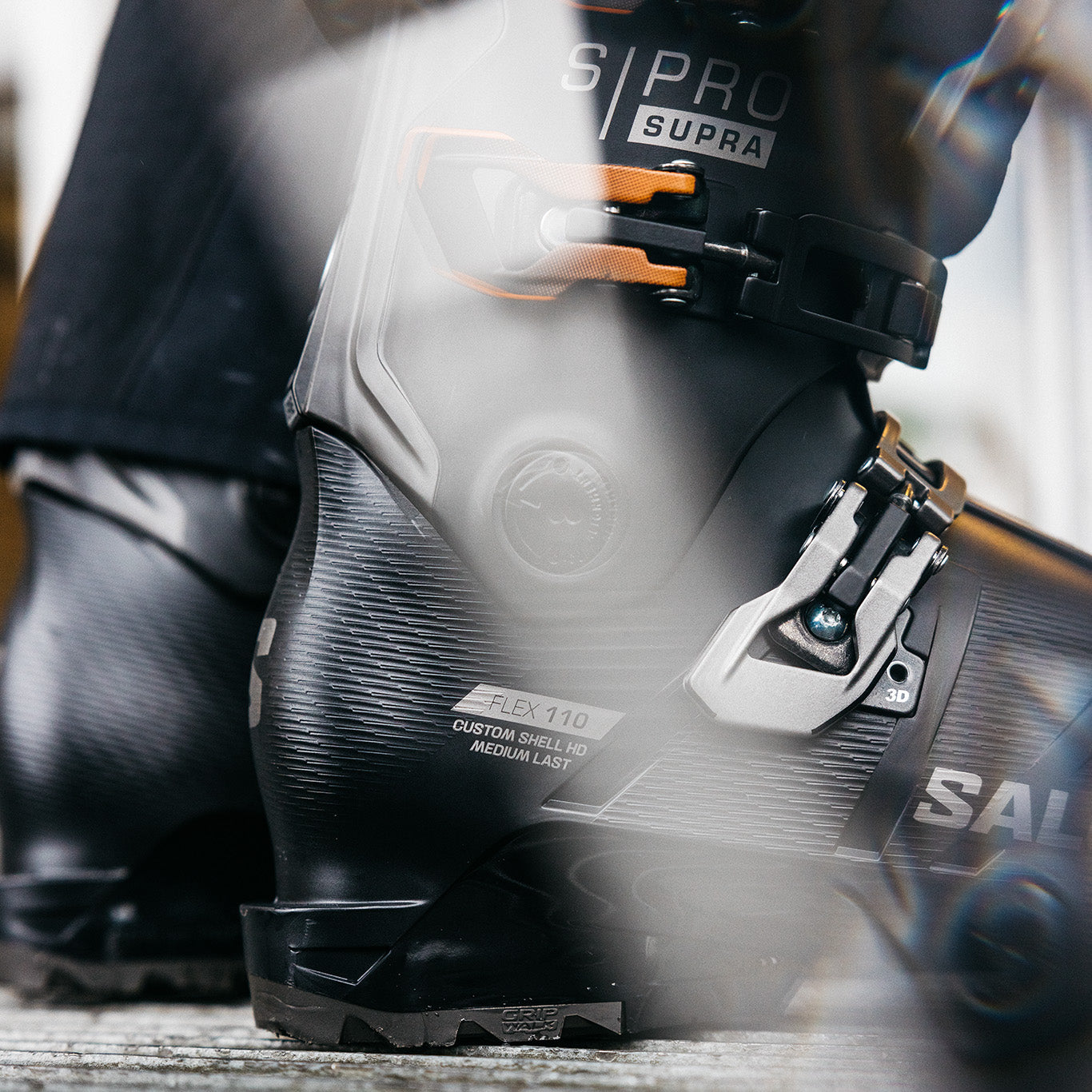 A closeup of some men's ski boots from Salomon.